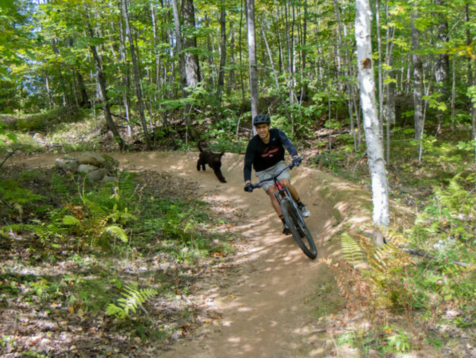 Musky Mountain biker with his dog